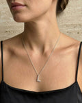 Cadena con dijes inicial